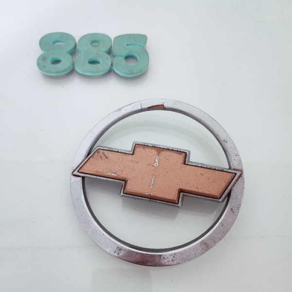 Emblema Da Grade Dianteira Gm Celta 2010 Cx 885